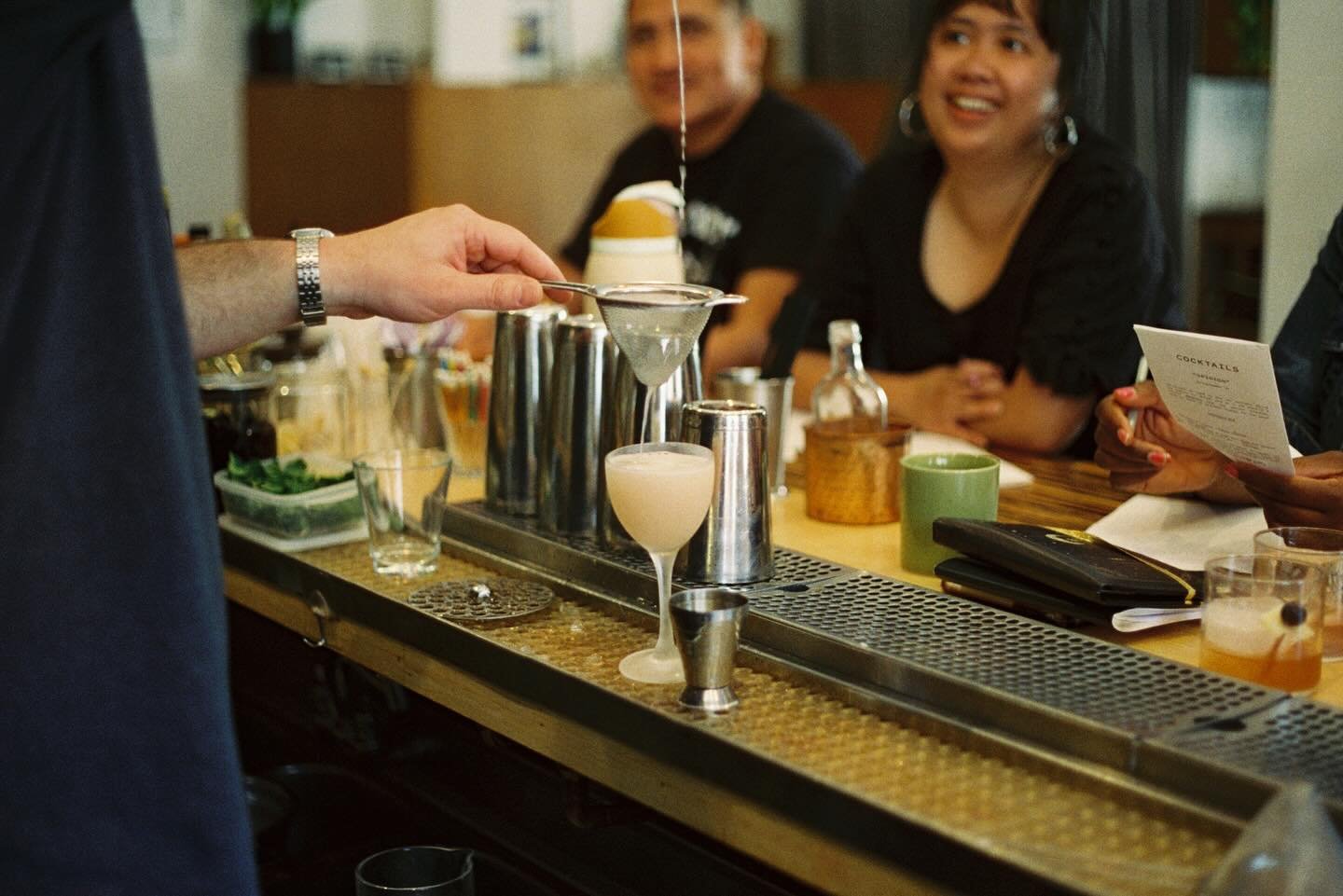 some quickie BTS film horizontals from Tuesday by our own @talltangerine !! 📸🍹&mdash; staff training led by @dannygotdonuts and @captainmrtnz, tasting 10 new cocktails, @wallflourpizza for family meal (SO GOOD), and my loveliest lady co-hosts, Wall